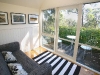 Upstairs sunroom and balcony are nice places for a cuppa.